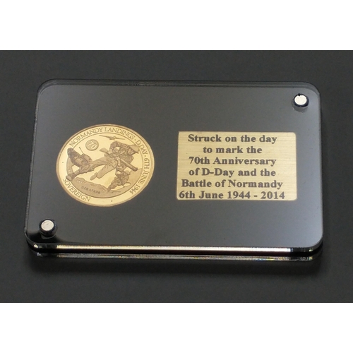 66 - A slabbed sovereign struck on 6th June 2014 in commemoration of the 70th anniversary of the D-Day an... 