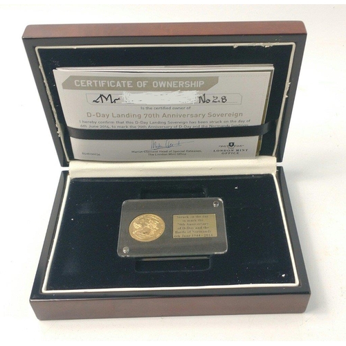 66 - A slabbed sovereign struck on 6th June 2014 in commemoration of the 70th anniversary of the D-Day an... 