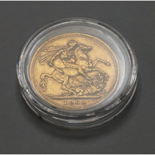 70 - An 1892 Queen Victoria head gold sovereign in a coin case within a London Mint Office box#70