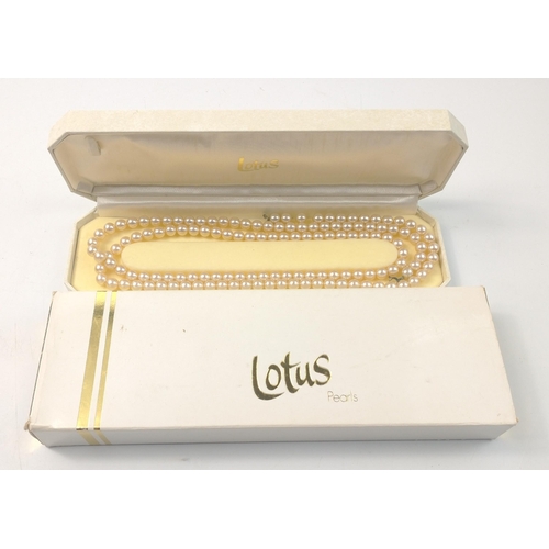 78 - A boxed and cased set of well presented simulated LORUS pearls. 110cm long single strand with worn c... 