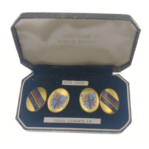 83 - A pair of DANIEL STEWARTS FP cufflinks in yellow metal - still within their original presentation je... 