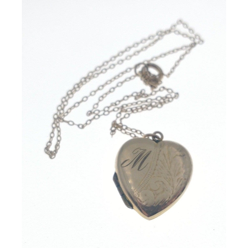 88 - A 9ct front and back metal filled locket, on unmarked chain weight 4.2g approx#88