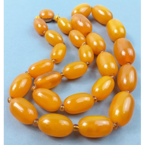 45 - A string of graduated sized amber style beads 60cm long approx#45