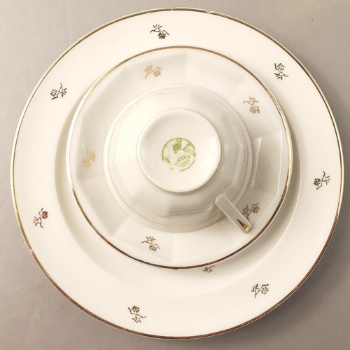 283 - LIMOGES - A very pretty, delicate tea service  in white with gilt floral decoration.  A very attract... 