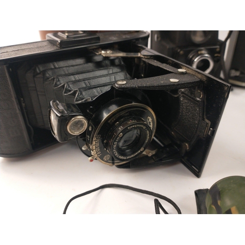 329 - A wonderful vintage photography lot to include a Super Six-20 Kodak Eastman folding camera with love... 