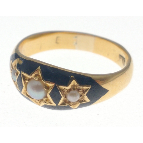 1 - A gold ring with very rubbed marks, initials HS maker mark, with black enamel and 3 small seed pearl... 