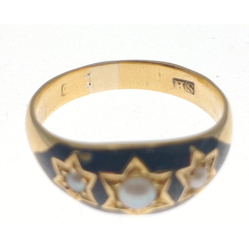 1 - A gold ring with very rubbed marks, initials HS maker mark, with black enamel and 3 small seed pearl... 