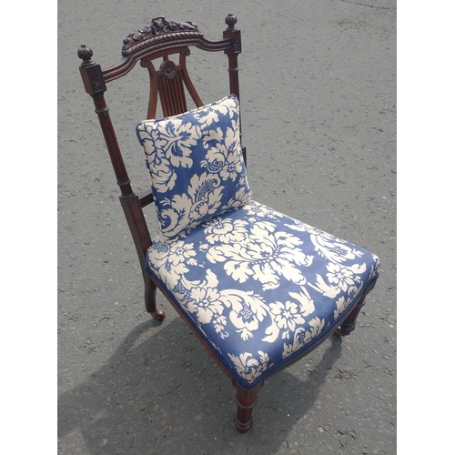 389 - A LYRE-backed child's chair with original ceramic wheels. This chair has been recently lovingly reco... 