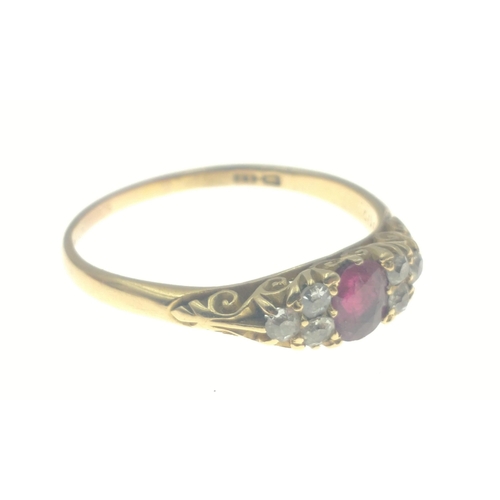 4 - A ladies 18ct Burmese ruby and diamond dress ring with 1907 inscription with a single ruby (5mm) sur... 