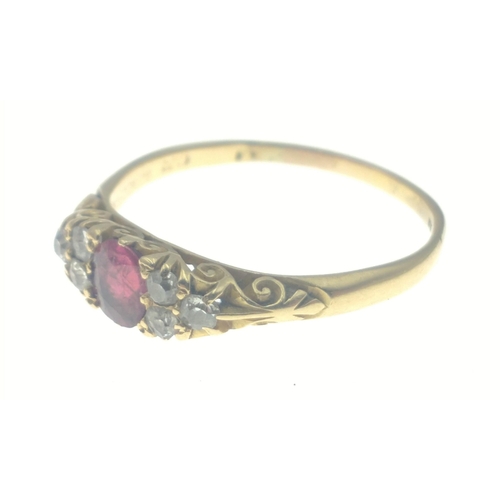 4 - A ladies 18ct Burmese ruby and diamond dress ring with 1907 inscription with a single ruby (5mm) sur... 