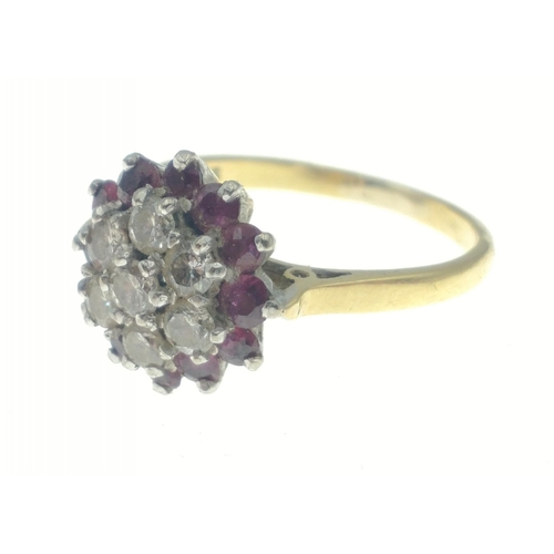 9 - An 18ct stamped yellow gold ring adorned with 7 diamonds each 2mm dia. approx (tested) centred and s... 