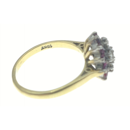 9 - An 18ct stamped yellow gold ring adorned with 7 diamonds each 2mm dia. approx (tested) centred and s... 