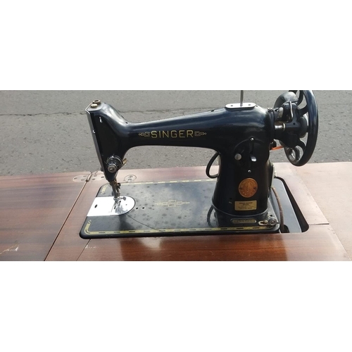 328 - A vintage electrified table SINGER sewing machine - ideal for the budding dress-maker! - model No EF... 