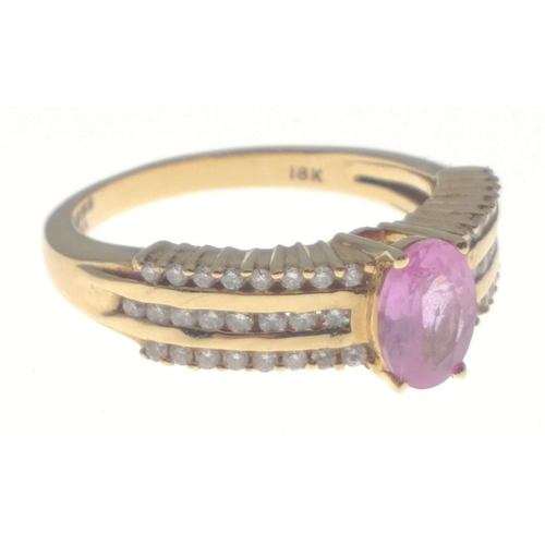11 - An Iliana 750 stamped 18K ring, with 24 diamonds (tested) on each shoulder and a central amethyst, s... 