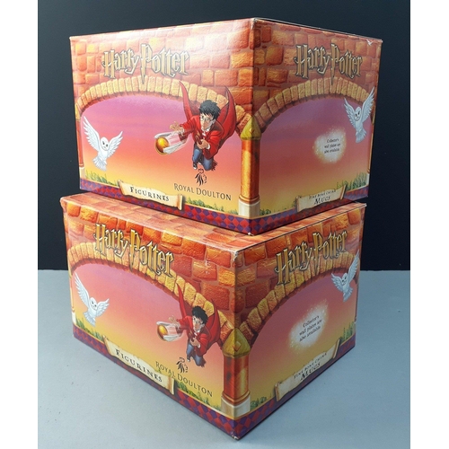 137 - Two boxed sealed ROYAL DOULTON HARRY POTTER figurines to include Wizard Training and Weasley Traditi... 
