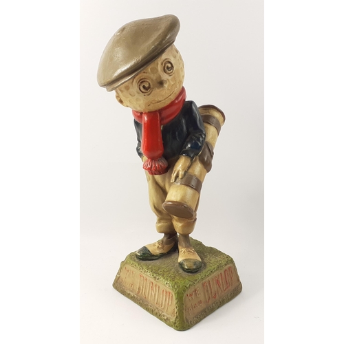 151 - A rare antique plaster 'WE PLAY DUNLOP' golf advertising caddy, circa 1950 standing approx 40cm tall... 