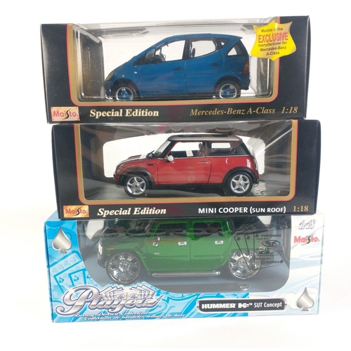 162 - Three special edition MAISTO 1:18 scale diecast models to include a MERCEDES-BENZ A-CLASS, MINI COOP... 