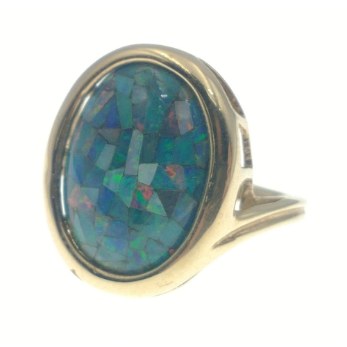 17 - A 375 stamped black opal (15mm approx) ring, size K, gross weight 4.5g approx#17