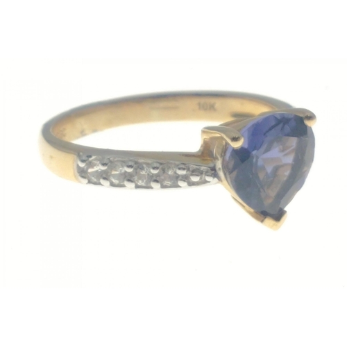 20 - A Jaipur India TGGC 10K Jaipur ring, with diamond shoulders and a central pear shaped tanzanite ston... 