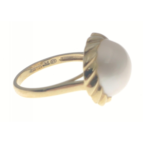 21 - A 9K marked gold ring with large domed white stone, size M, gross weight 3.1g approx#21