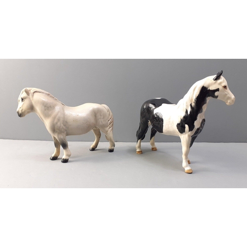 216 - ROYAL DOULTON SHETLAND PONY model No DA185 - the wee pony has a minute chip on the tip of the left e... 