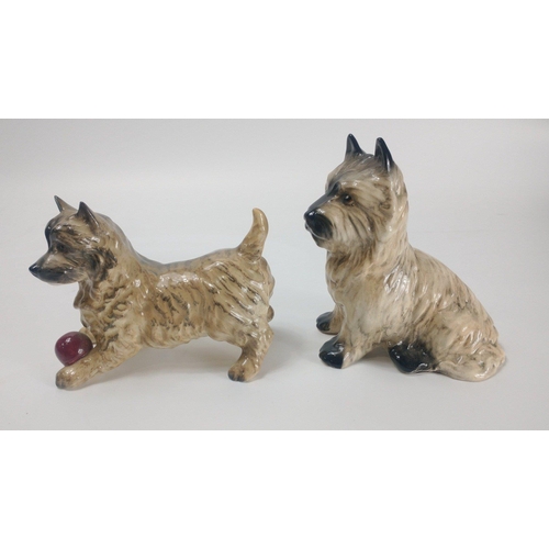 231 - A small BESWICK terrier with red ball, 13cm long, a SYLVAC terrier (3447) 13cm tall, a matt SYLVAC t... 