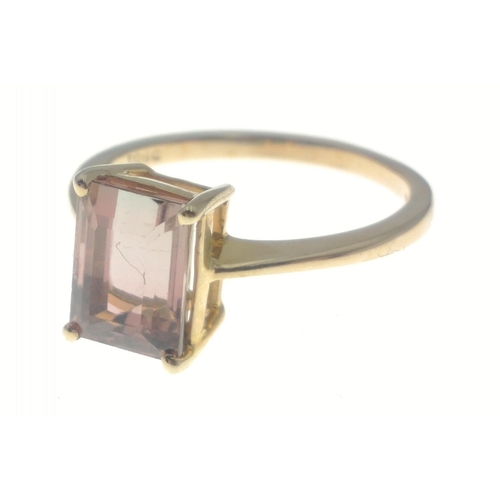 28 - A 10K gold ring with large rectangular pink stone, size K, gross weight 2.05g approx#28