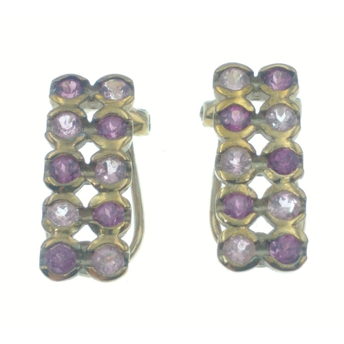 29 - Fully hallmarked 375 clip-on gold earrings set with purple and clear stones each 15mm long, gross we... 
