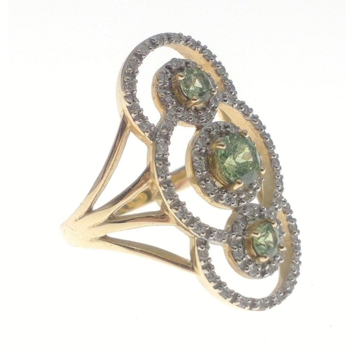 36 - A stunning 585 stamped gold ring set with 3 peridots and circlets of small diamonds (30mm long), siz... 