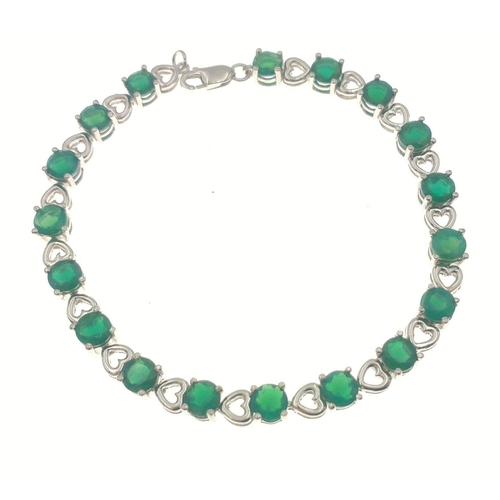 84 - A 925 TGGC tennis bracelet set with green stones interspersed with hearts, 19cm approx#84