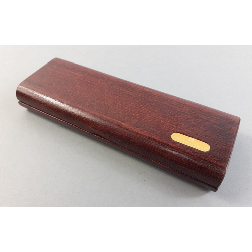 104A - Gold plated St Dupont of Paris ball point pen in wooden presentation case. Clip engraved with 