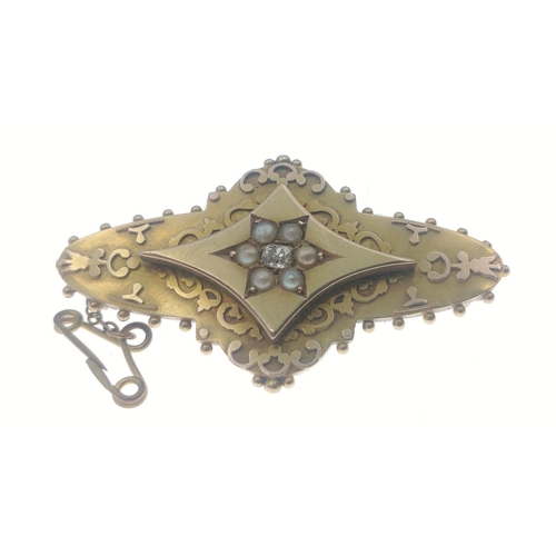 11 - A 625 stamped Birmingham yellow gold pin mourning brooch with small central DIAMOND with floral desi... 