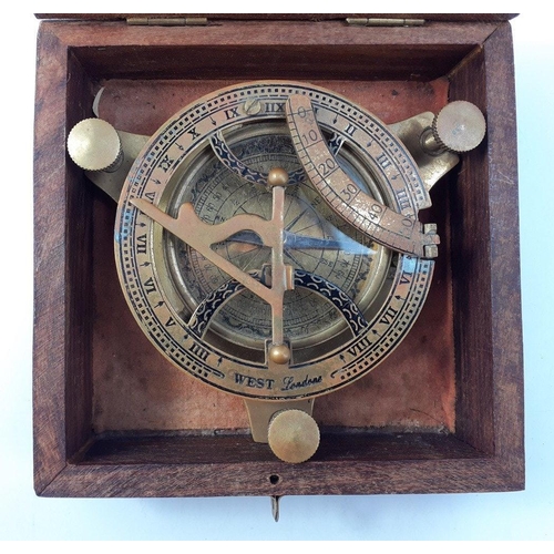 118 - A modern WEST of London boxed brass travelling compass,10cm approx#141