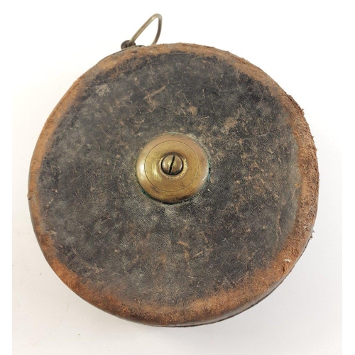 127 - A vintage leather bound tape measure stamped NORTH BRITISH RAILWAY, Engineer's Office, Edinburgh.  I... 