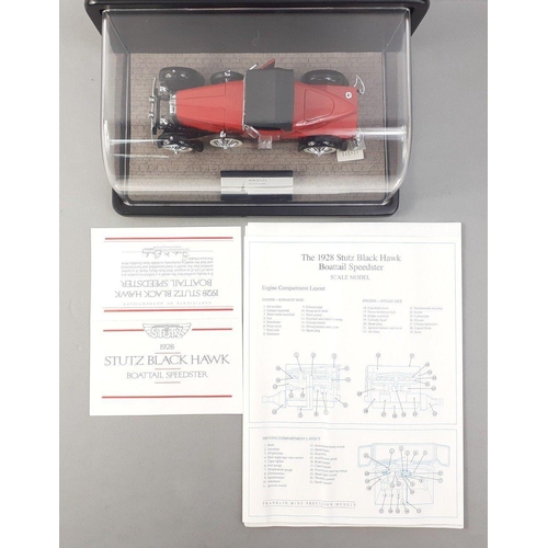 140 - A Franklin Mint 1928 STUTZ BLACK HAWK BOATTAIL SPEEDSTER in display case with paperwork and certific... 