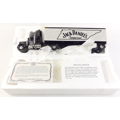 153 - Two MATCHBOX collectible large whisky lorries to include KS189 Peterbilt Jack Daniels and KS190 Spir... 