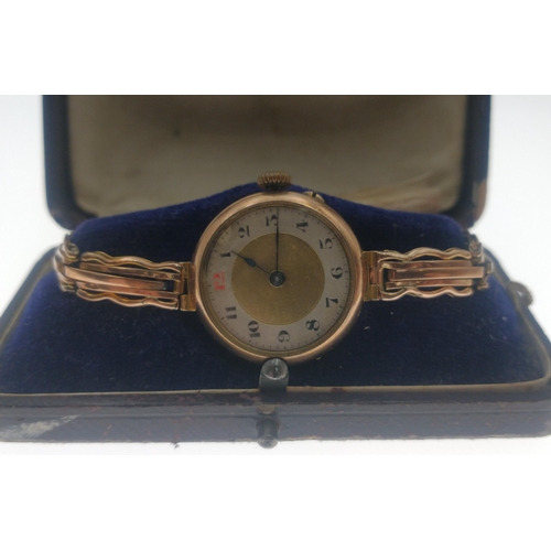 18 - An ANTIQUE 375 stamped yellow gold watch case with a 9ct stamped yellow gold bracelet gross weight 2... 