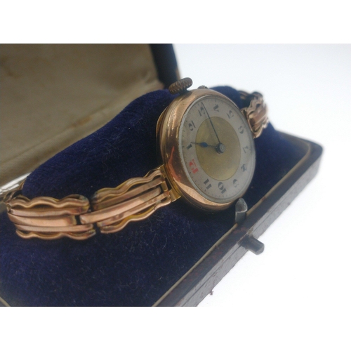 18 - An ANTIQUE 375 stamped yellow gold watch case with a 9ct stamped yellow gold bracelet gross weight 2... 