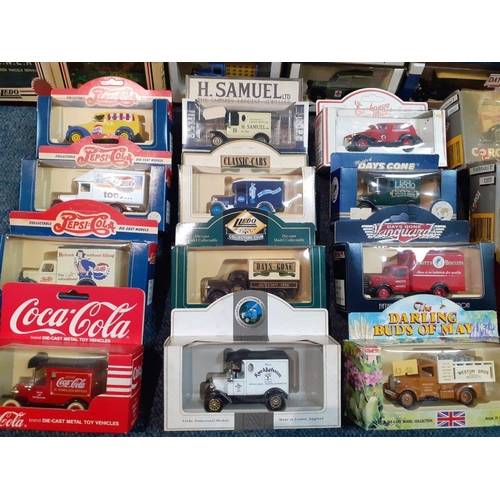 182 - A large box of collectible boxed model cars to include Boots Vintage Collection model van, a Pepsi-C... 