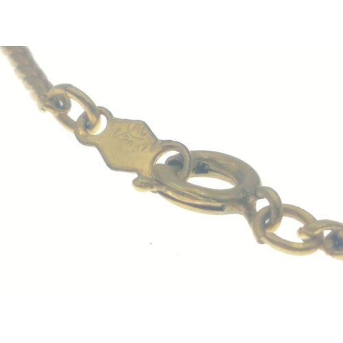 25 - A stamped AU 1/20 12k small yellow gold plated bracelet with a small pearl inset - gross weight 2.46... 