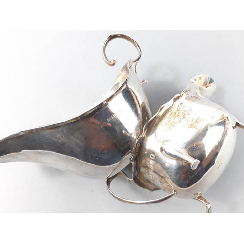 28 - Two sterling silver sauceboats one by VINERS London 1934 and the other Birmingham 1931. Gross weight... 