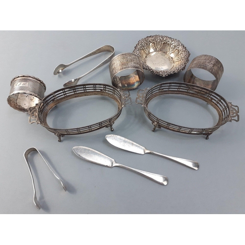 31 - A small silver lot to include silver sugar nips, butterknives, napkin rings etc, total weight 190g a... 