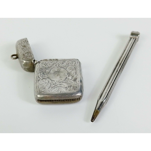 32 - A small silver vesta case with wear (hallmarked for Birmingham) gross weight 16g approx, and also a ... 