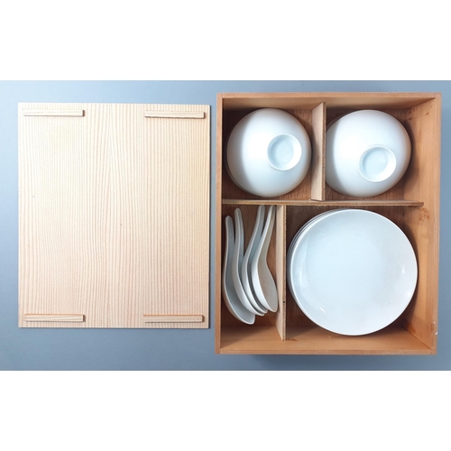A wooden cased Japanese rice bowl set comprising 4 each of bowls plates ...