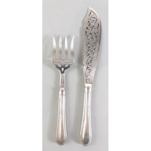 36 - A fully hallmarked cake slice and fork with filled handles, Sheffield 1880, made by Richard Martin &... 