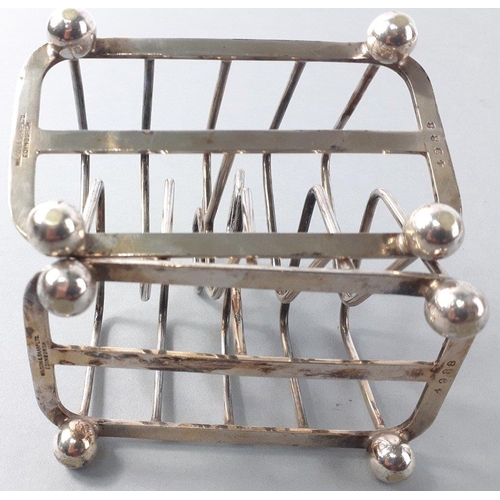 44 - Two small EP toast racks stamped WILSON & SHARP Edinburgh, plus 2 small  EP butter dishes, one s... 