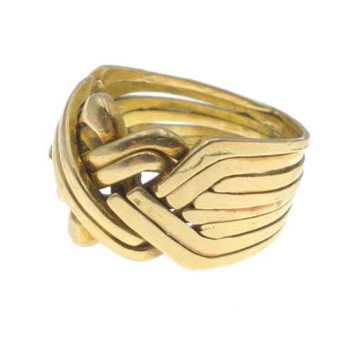 5B - A SUBSTANTIAL yellow metal ring stamped 18 in Arabic independent jewellers tested as 18-22ct, made t... 