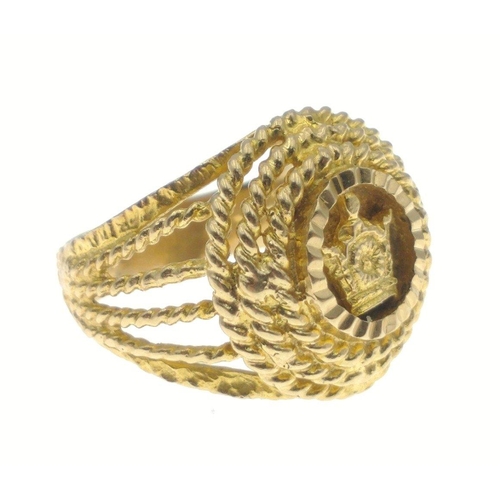 5C - A SUBSTANTAL highly decorative large yellow metal unstamped ring purchased in the Middle East in the... 