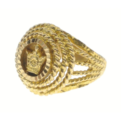 5C - A SUBSTANTAL highly decorative large yellow metal unstamped ring purchased in the Middle East in the... 