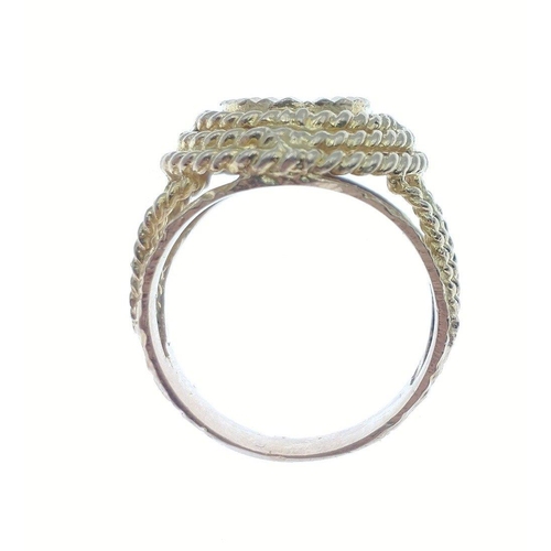 5C - A SUBSTANTAL highly decorative large yellow metal unstamped ring purchased in the Middle East in the... 